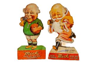 Advertisement: Mick McQuaid -Mick, plug and cut plug, cardboard cut-outs, one a Santa Claus and