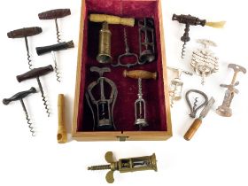 A Private One-Man Collection of Vintage Cork Screws, to include a late 19th Century brass and carved