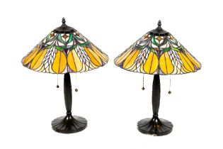 An attractive pair of Tiffany style bronzed resin Table Lamps, each with a colourful stain glass