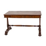 A William IV period mahogany Library Table, the rectangular moulded top with a frieze drawer to