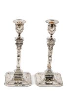 A good pair of late 19th Century Adams style silver Candlesticks, Sheffield 1898, each embossed with