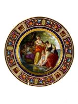 An attractive 19th Century hand painted Royal Vienna Cabinet Plate, the central panel signed