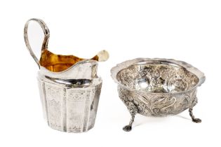 An Irish silver Georgian style Sugar Bowl, Dublin 1930, chased with swan, fox and scrolling vines