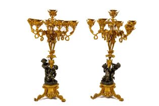 An important large pair of 19th Century French bronze and ormolu seven light Candelabra, with cherub