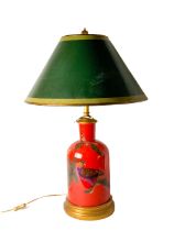 A modern red ground chinoiserie style Table Lamp, with birds, moths and flowers, and a green