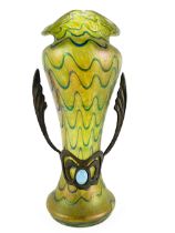 A green iridescent Art Nouveau glass Vase, with bronzed metal mounts, 26cms (10"). (1)