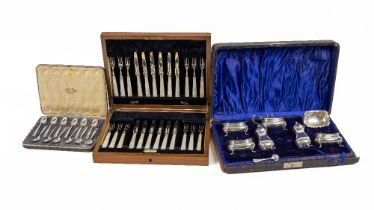 A large cased Edwardian silver Condiment Set, with four Salts, two pepper Shakers and a Mustard Pot,