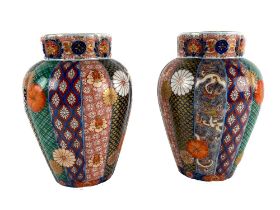 A pair of attractive 19th Century Japanese tubular porcelain Vases, of reeded colourful panel form