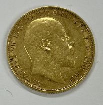 Coins: A 1905 King Edward VII full Sovereign, (some wear) otherwise good. (1)