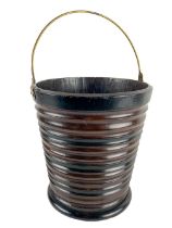 A 19th Century Dutch 'Teestof' barrel design Bucket, of tapering form (lacks liner), on circular