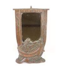 A very unusual Chinese bronze Table Mirror, the frame with a scene in relief with figure on a