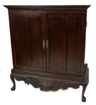A fine quality Irish Georgian style mahogany Linen Press, the dentil moulded cornice over panelled
