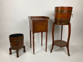 A 19th Century mahogany Bedside Pot Cupboard, with a three quarter gallery above a single door on