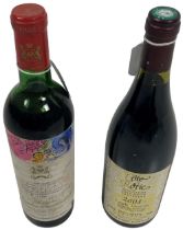 1970 Mouton Rothschild, 1 bottle; and a 2001 Cote Rotie, 1 bottle. (2)