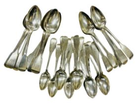 A set of 13 Irish Georgian silver crested Dessert Spoons, with rat-tail design, Charles Marsh,