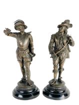 A bronzed metal Figure of "Don Juan," wearing a plumed hat and brandishing a sword and another "