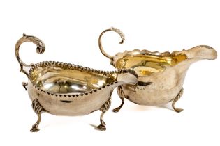 A Georgian style silver Sauceboat, by Harman London 1930, together with another similar Birmingham