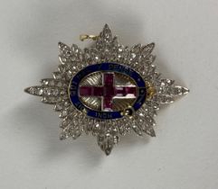 An important Order of the Garter Brooch, with 'Honi Soit Qui Mal Y Pense,' set in platinum and gold,