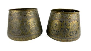 A pair of 19th Century brass Middle Eastern Jardinières, of pierced and embossed decoration
