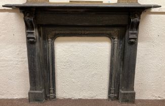 A Victorian Scottish cast iron Fire Surround, and inset by the Etra Foundry, Glasgow, stamped with
