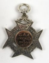 1904 G.A.A. (Limerick & London) Medal Medal: G.A.A. (Limerick & London) 1904. A rare silver cross