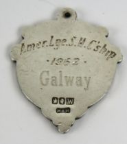 Medal: G.A.A. [Hurling 1962], A silver shield shaped and etched Medal, the obverse with central gold