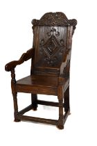 [Jonathan Swift] An important 17th Century Wainscot oak Armchair, c. 1680, the back with ornate