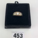 Silver ring with 3 white stones
