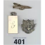 Plated ingot, tie clip and badge