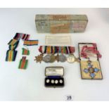 Group of 7 war medals on bar, CBE medal and cased buttons