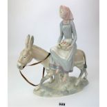 Spanish figure of woman on donkey