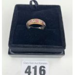9k gold red/white stone eternity ring