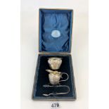 Silver cased miniature jug and sugar bowl with sugar nips from John Dyson & Sons, Leeds.