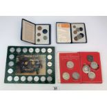 4 x commemorative coin sets in folders