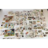 Box of mixed cigarette cards and albums