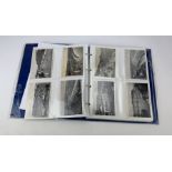 Blue postcard album of mixed postcards