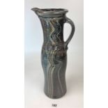 Studio art pottery Jug. Signed Michael Casson. 18” high.