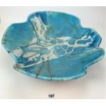 Art pottery stoneware blue dish on metal stand 5” high, 21” diameter