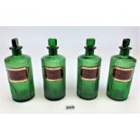 4 green glass medicine poison bottles. 7” high