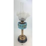 Hand painted flower design turquoise glass and brass oil lamp. 28” high