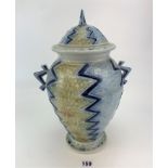 Studio art salt glazed pottery lidded vase signed Andrew Osborne ’87. 15” high