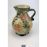 Studio Art Pottery earthenware jug. Signed Paul Jackson. 8.5” high.