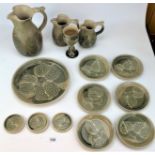 14 pieces of Studio art pottery- plates, jugs, goblets. Signed.