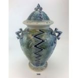 Studio art salt glazed pottery lidded vase signed Andrew Osborne ’87. 18” high