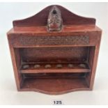 Wooden pipe rack with face