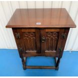 Carved oak cupboard