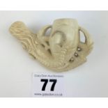 Clay pipe bowl with claw design