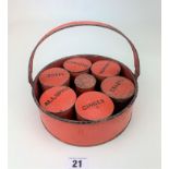Round red metal herb box with grinder