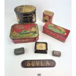 Assorted vintage advertising tins