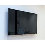 Samsung television 75" with remote and Sanus Tv wall mount